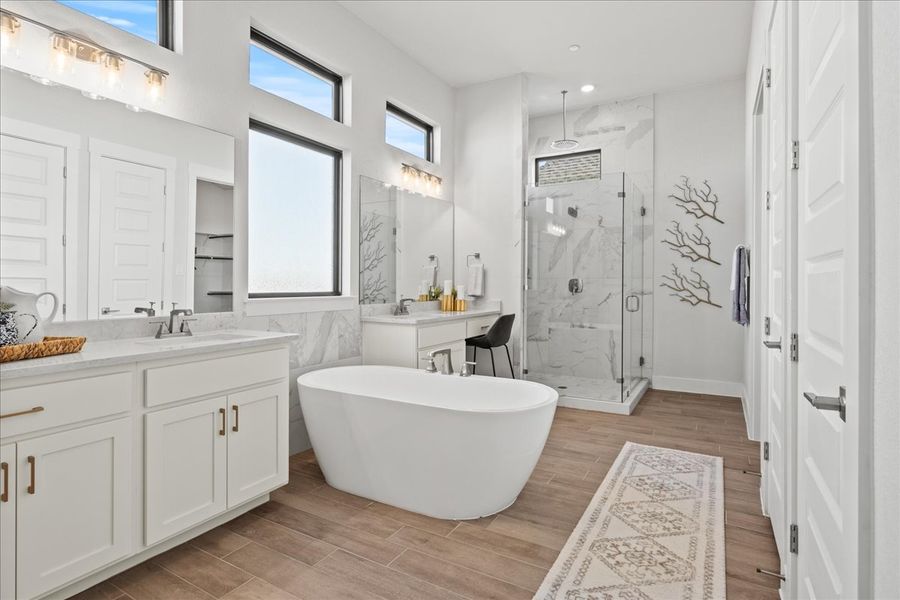 Representative furnished interior of a home built from the Bradley by Chesmar Homes in Sweetwater, Austin (Image 12).