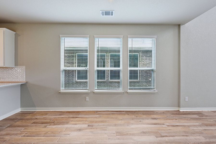 Dining room in the Medina floorplan at a Meritage Homes community.