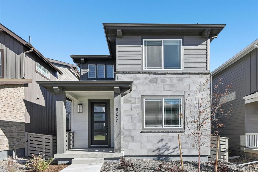 Exterior details and patio area of a home in The Villas Collection at Sterling Ranch, Littleton (Image 22).