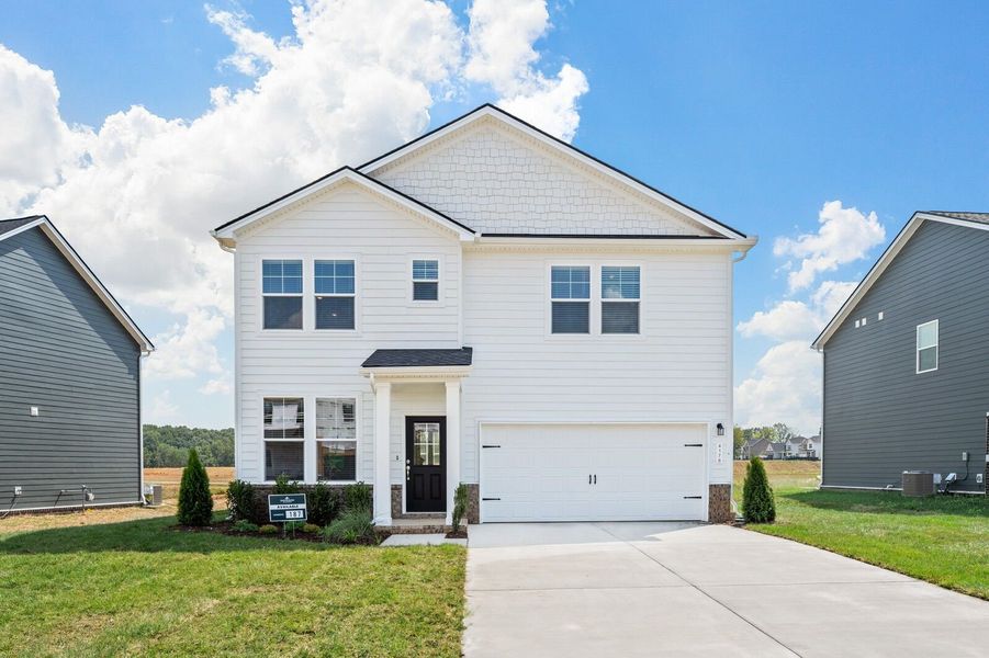 Front exterior of a new home in Calista Farms, White House, TN, highlighting curb appeal (Image 17).