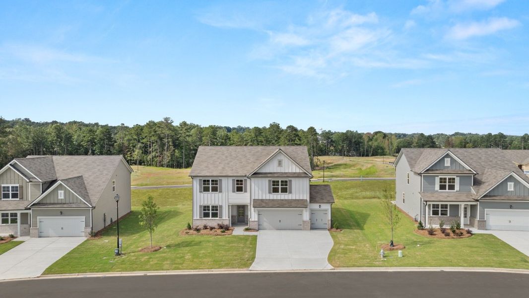 Representative exterior photo of a completed home built from the Green by D.R. Horton in Fairway 17 at Mirror Lake, Villa Rica, GA (Image 23).