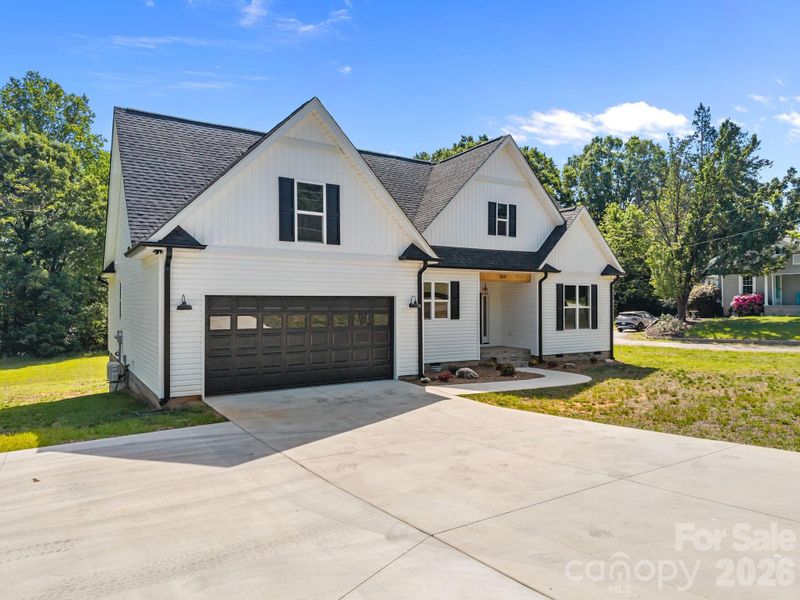 Front exterior of a new home in , Salisbury, NC, highlighting curb appeal (Image 20).