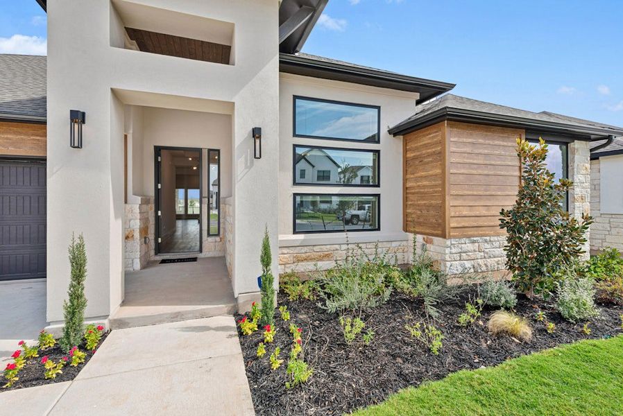 Exterior details and patio area of a home in Santa Rita Ranch, Liberty Hill (Image 3).