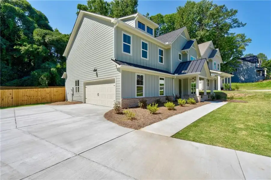 Front exterior of a new home in , Atlanta, GA, highlighting curb appeal (Image 31).