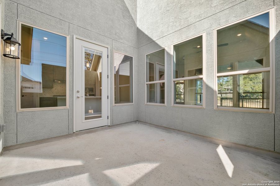 Exterior details and patio area of a home in Ventana, Bulverde (Image 19).