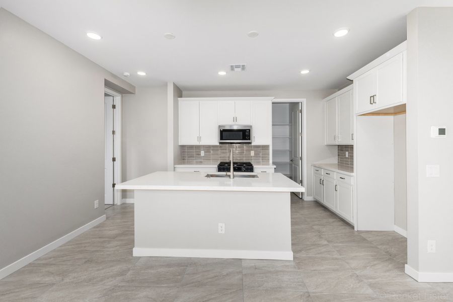 Furnished interior view inside a new home in Mira Vista at Victory, Buckeye (Image 4).