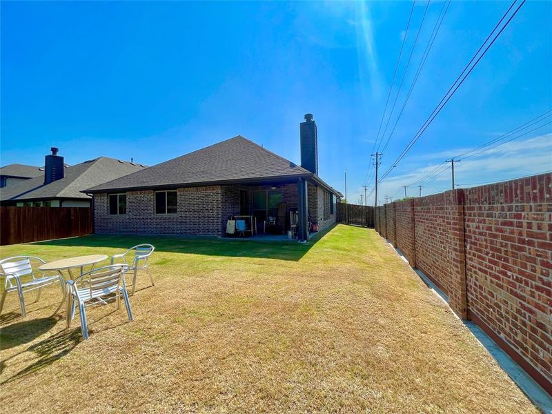 View of yard with a patio area and central AC unit