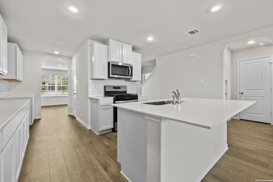 Furnished interior view inside a new home in Redbird Ranch, San Antonio (Image 7).