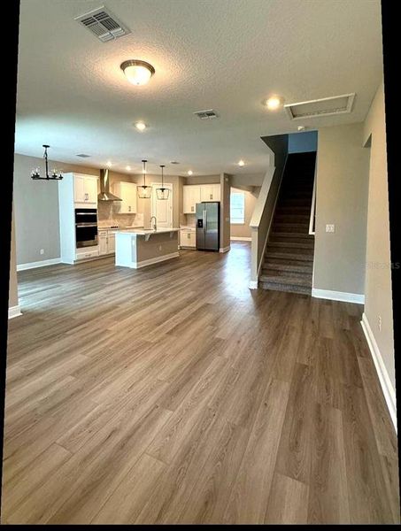 Spacious, unfurnished interior of a new home in Legends Preserve - Signature Series, Daytona Beach (Image 18).