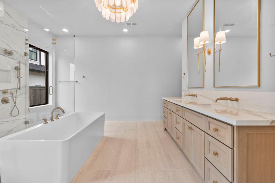 The enchanting spa-like main bath. Representative image.