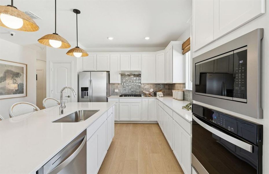 Abundant cabinet space in kitchen *Model Representation* Abundant cabinet space in kitchen *Model Representation*