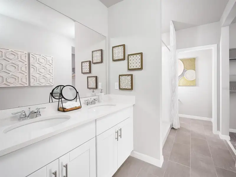 Furnished interior view inside a new home in Crescent Lakes - Premier Series, Punta Gorda (Image 6).