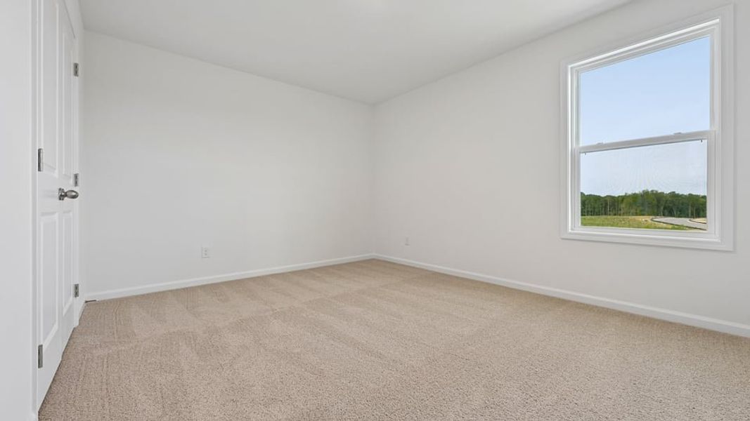 Representative unfurnished interior of a home built from the Summit by D.R. Horton in Kalas Falls, Wake Forest (Image 36).