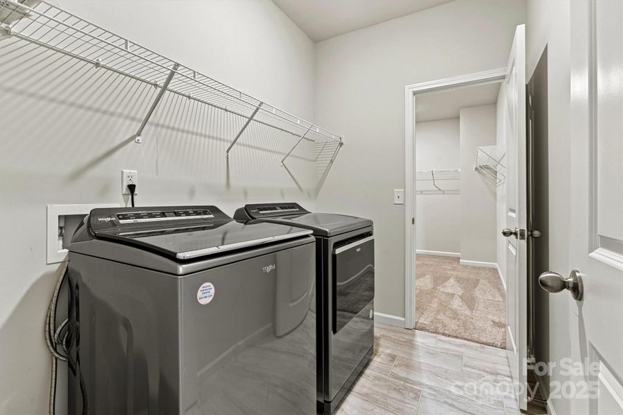 The spacious upstairs laundry room offers everyday convenience with included washer and dryer—making chores a breeze right where you need them most The spacious upstairs laundry room offers everyday convenience with included washer and dryer—making chores a breeze right where you need them most