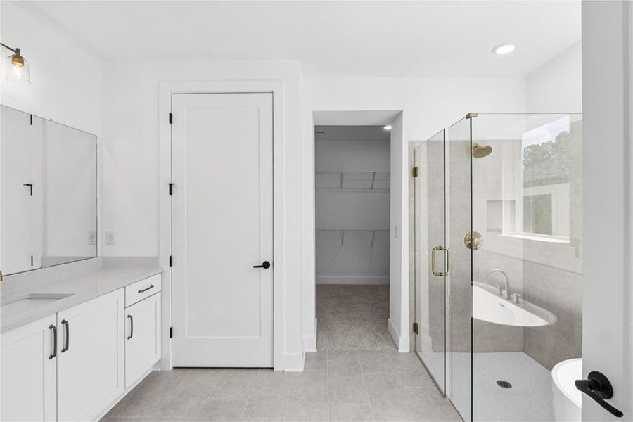 Furnished interior view inside a new home in Maple Grove at Towne Lake, Woodstock (Image 5).