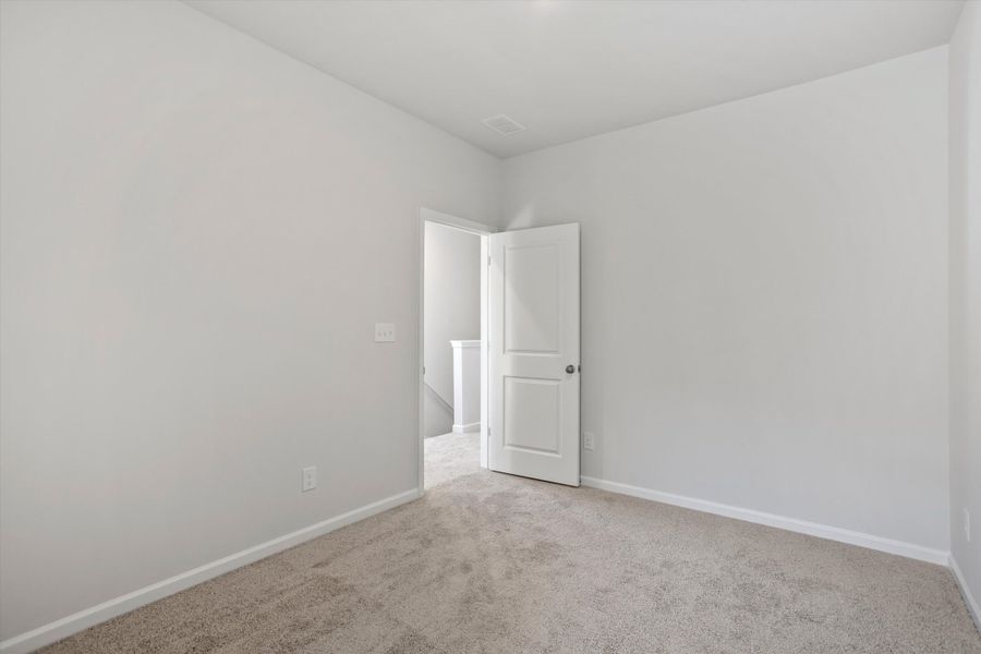 Spacious, unfurnished interior of a new home in Renaissance at White Oak, Garner (Image 24).