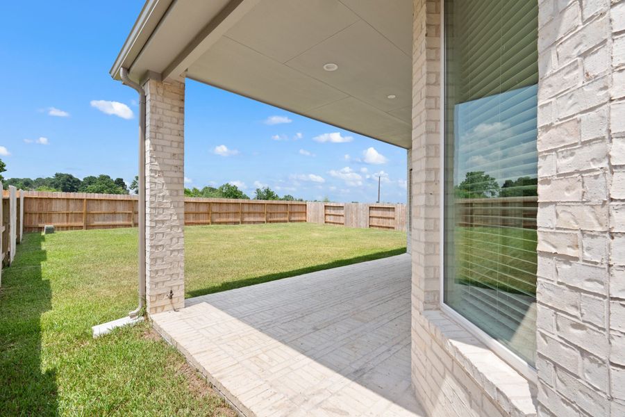 Exterior details and patio area of a home in Artavia, Conroe (Image 4).