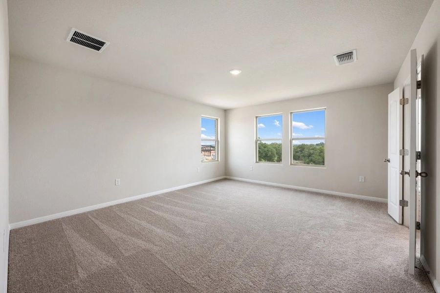 Spacious, unfurnished interior of a new home in The Colony, Bastrop (Image 23).