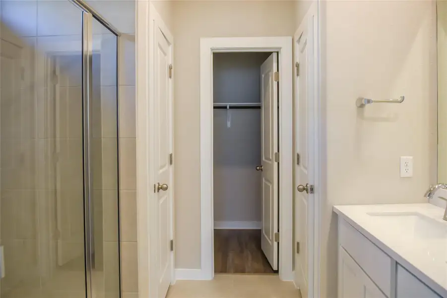Primary Bath with dual vanities & walk-in shower
