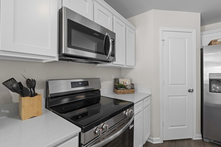 Representative furnished interior of a home built from the Alder C by McGuinn Homes in Forts Ridge, Pelion (Image 48).