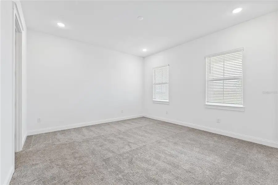 Spacious, unfurnished interior of a new home in Osprey Ranch, Winter Garden (Image 38).