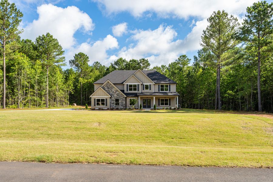 Front exterior of a new home in Flint Farms, Concord, GA, highlighting curb appeal (Image 25).