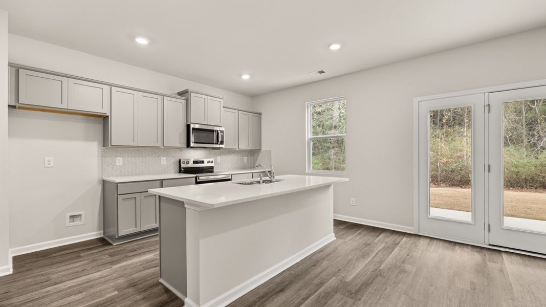 Furnished interior view inside a new home in The Reserve at Calcutta, Stockbridge (Image 5).