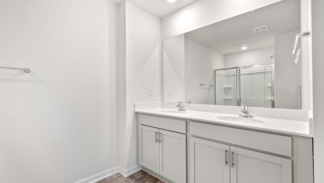 Furnished interior view inside a new home in Paddock Point, Roebuck (Image 12).