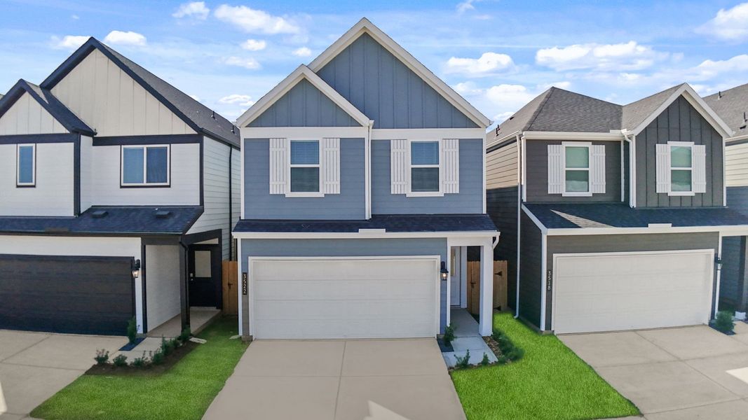Front exterior of a new home in Villarosa at Tamarron, Katy, TX, highlighting curb appeal (Image 31).