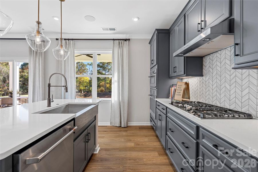 Large windows let light into the space and keep costs low with energy efficiency. Large windows let light into the space and keep costs low with energy efficiency.