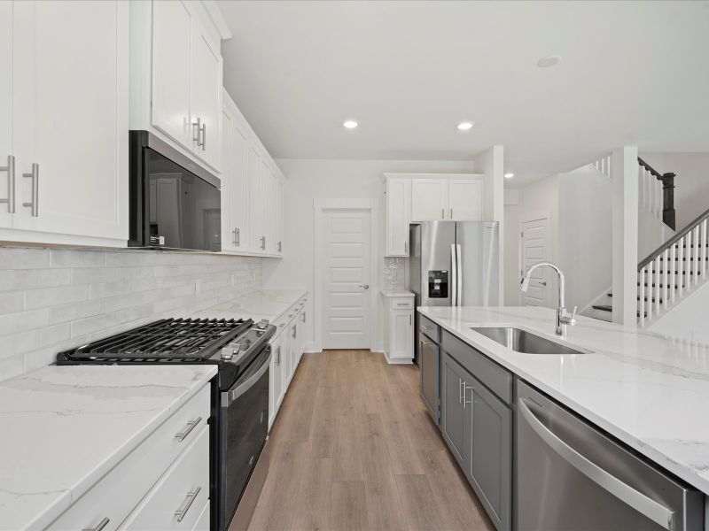 Furnished interior view inside a new home in The Coves at Lakes of Cane Bay, Summerville (Image 9).