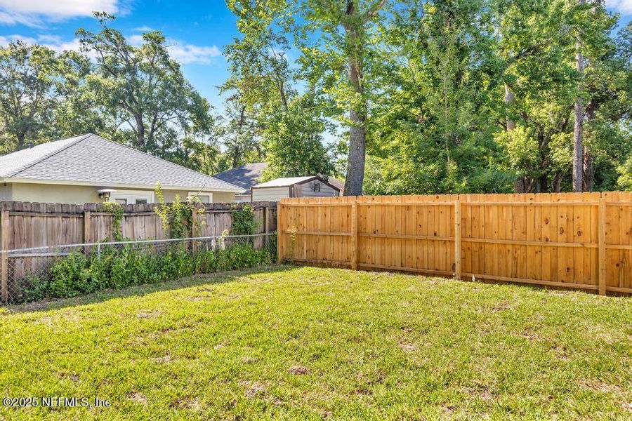 Front exterior of a new home in , Jacksonville, FL, highlighting curb appeal (Image 20).