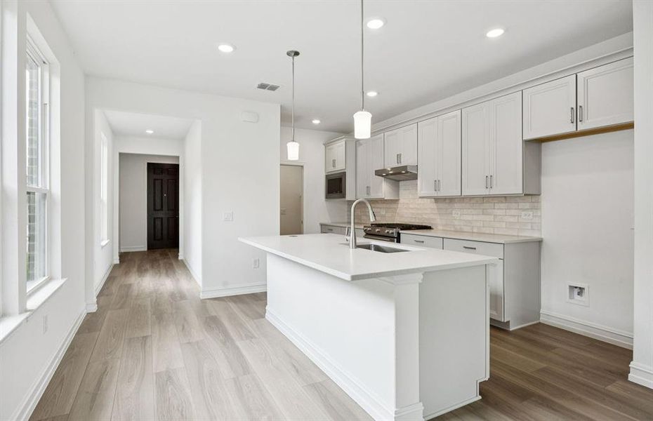 Abundant cabinet space in kitchen