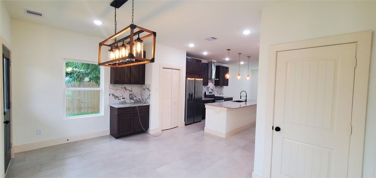 Dining room features a coffee/tea station and charging station for all electronic gadgets.