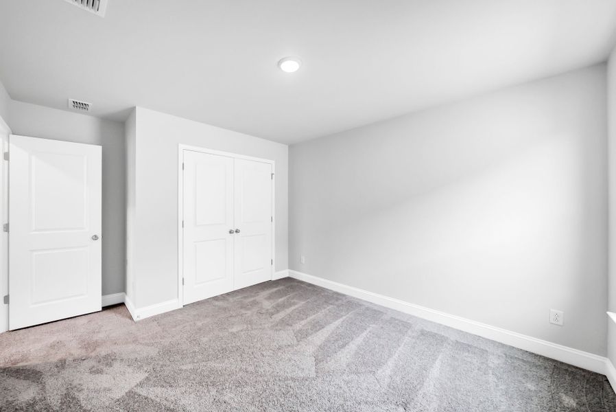 Spacious, unfurnished interior of a new home in Monroe Preserve, Chapin (Image 28).