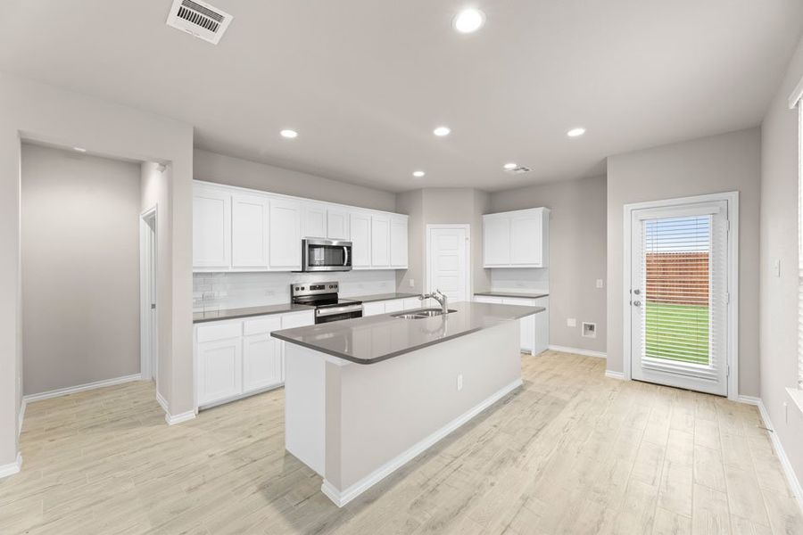 Representative exterior photo of a completed home built from the Willow by Impression Homes in Creekside Ranch, Blue Ridge, TX (Image 5).