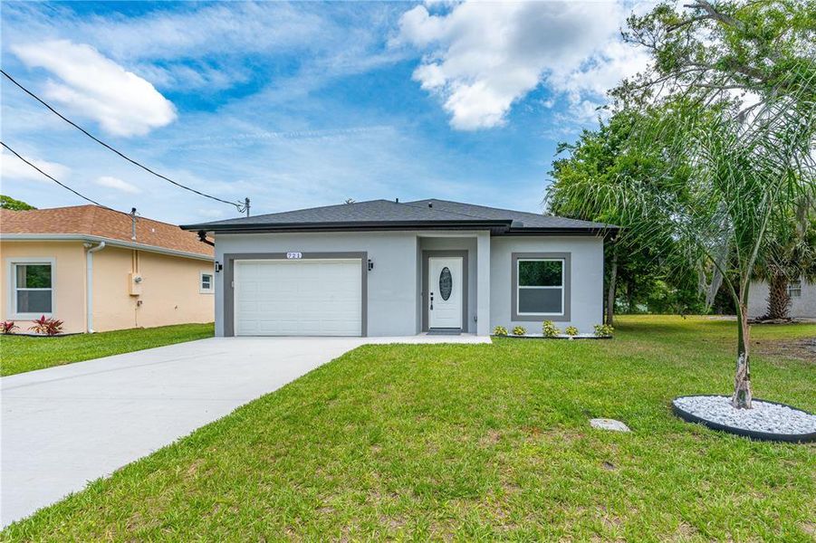 Front exterior of a new home in , Daytona Beach, FL, highlighting curb appeal (Image 2). Front exterior of a new home in , Daytona Beach, FL, highlighting curb appeal (Image 2).