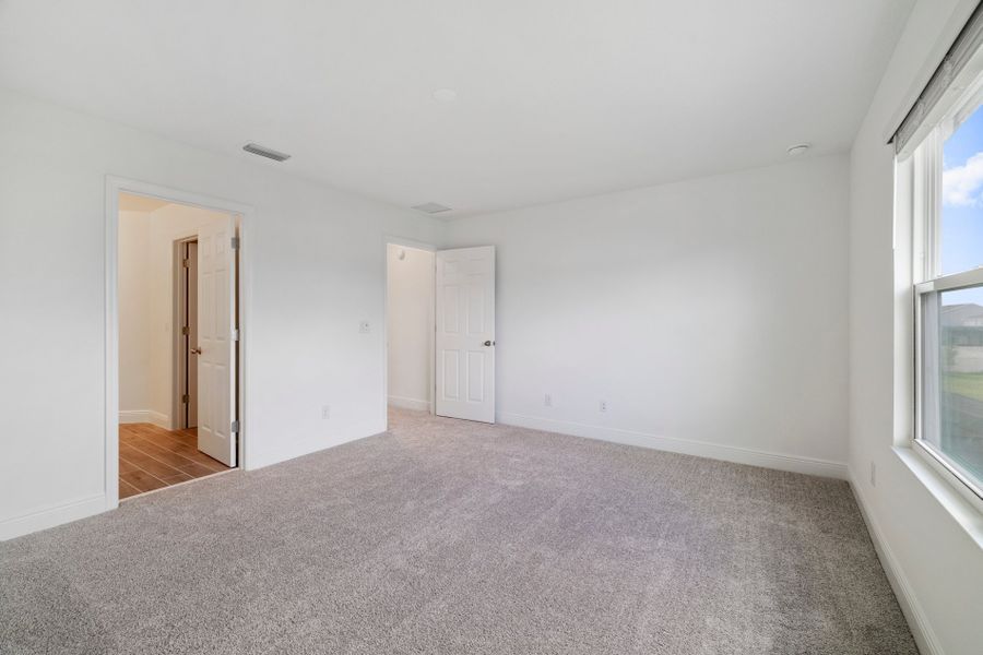 Representative unfurnished interior of a home built from the Newcastle by Risewell Homes in Park View at the Hills, Minneola (Image 11).