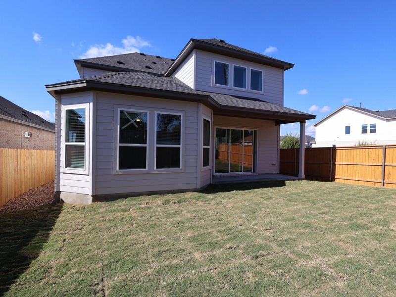 Exterior details and patio area of a home in Cedar Brook, Leander (Image 12).