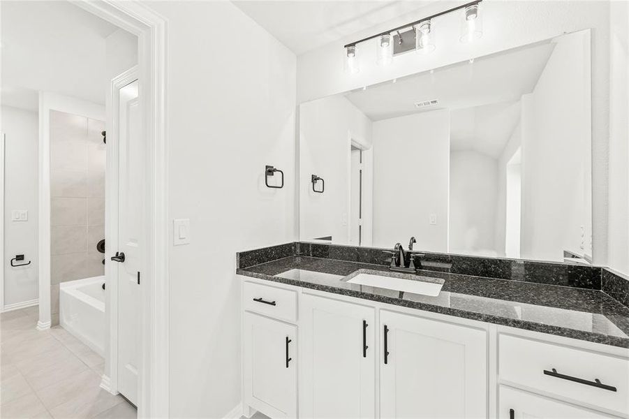 Furnished interior view inside a new home in Creekview Meadows, Pilot Point (Image 11).