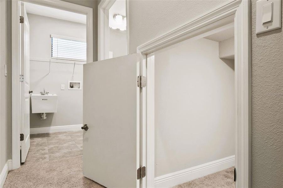 Understairs Storage next to Laundry Room