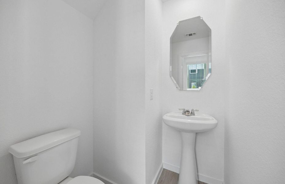 Furnished interior view inside a new home in The Courtyards at Stokesbury, Waller (Image 7).