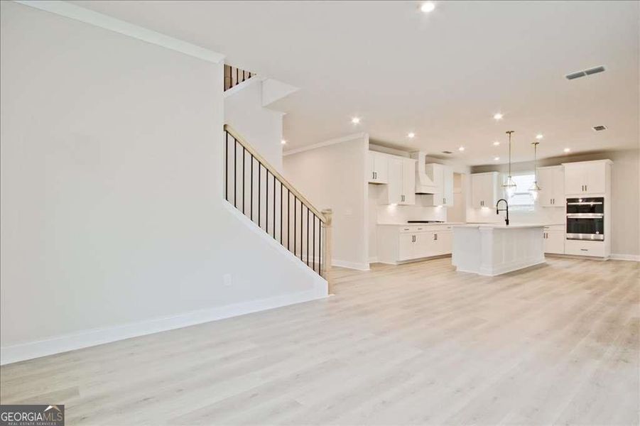 Spacious, unfurnished interior of a new home in The Paddocks at Doc Hughes, Buford (Image 23).