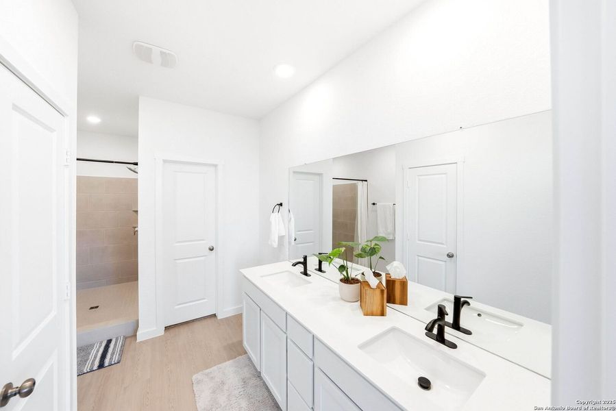 Furnished interior view inside a new home in Hidden Trails: Coastline Collection, Bulverde (Image 9).