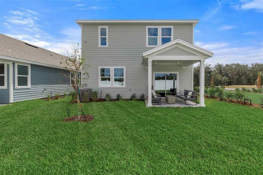 Exterior details and patio area of a home in , Palm Coast (Image 4). Exterior details and patio area of a home in , Palm Coast (Image 4).