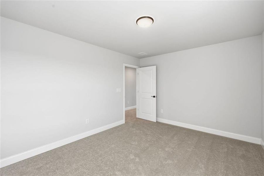 Spacious, unfurnished interior of a new home in Berkeley Mill, Cumming (Image 53).