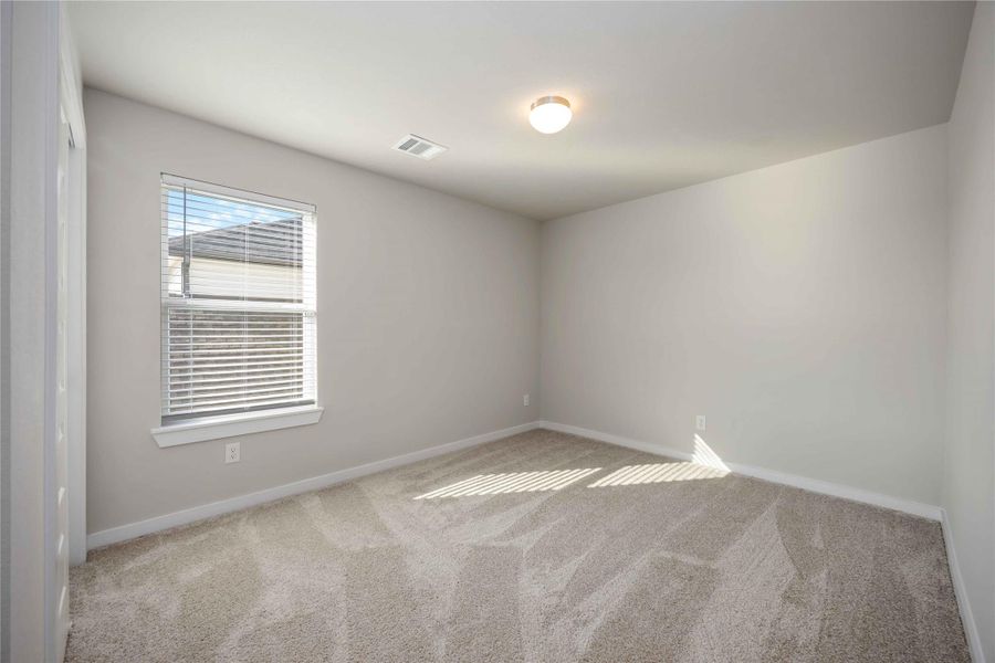 Upstairs bedroom offering privacy and comfort, perfect for kids or guests. Upstairs bedroom offering privacy and comfort, perfect for kids or guests.