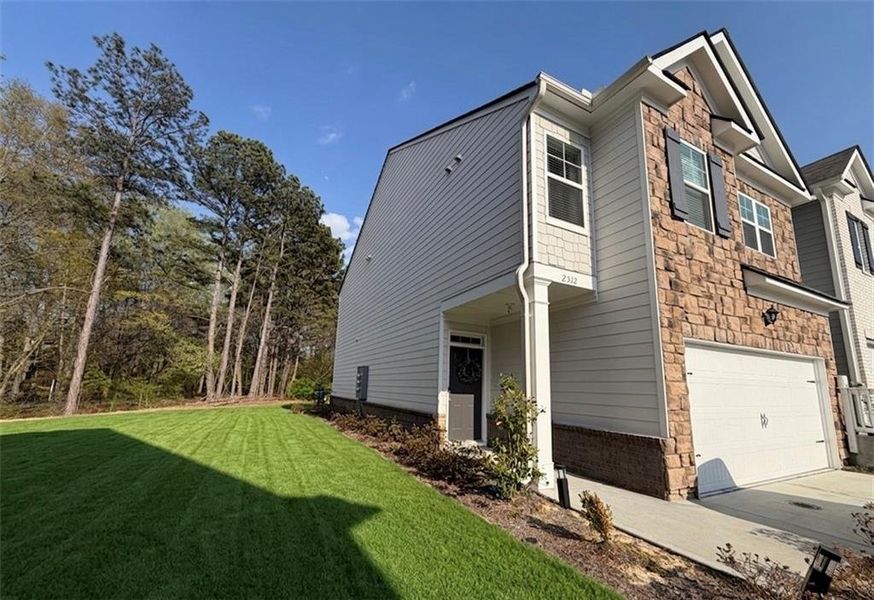 Exterior details and patio area of a home in , Buford (Image 22). Exterior details and patio area of a home in , Buford (Image 22).