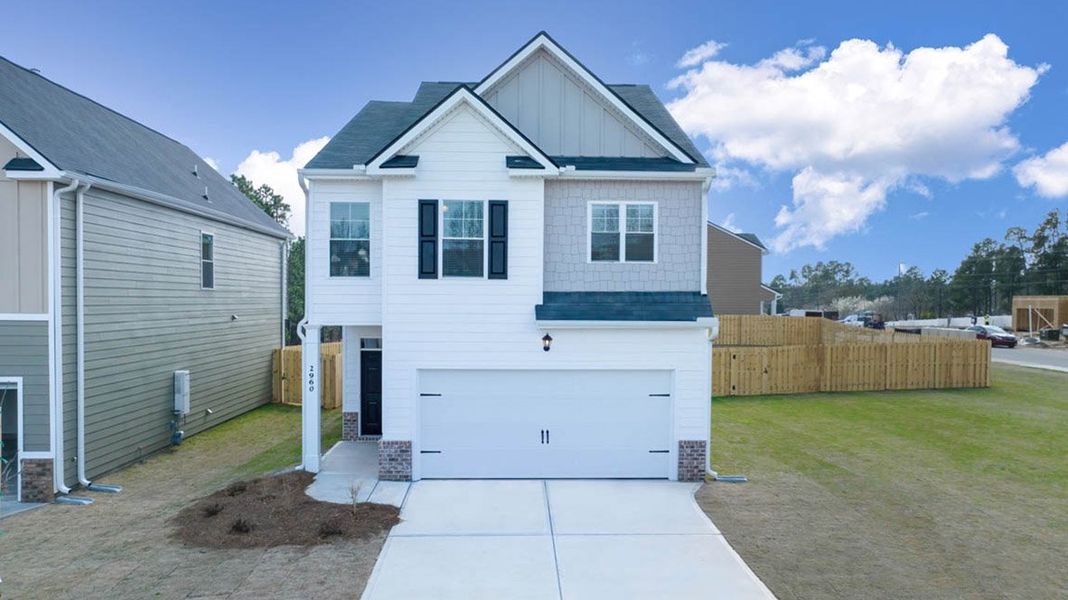 Representative exterior photo of a completed home built from the Somerset by D.R. Horton in Poplar Preserve, Newnan, GA (Image 2).