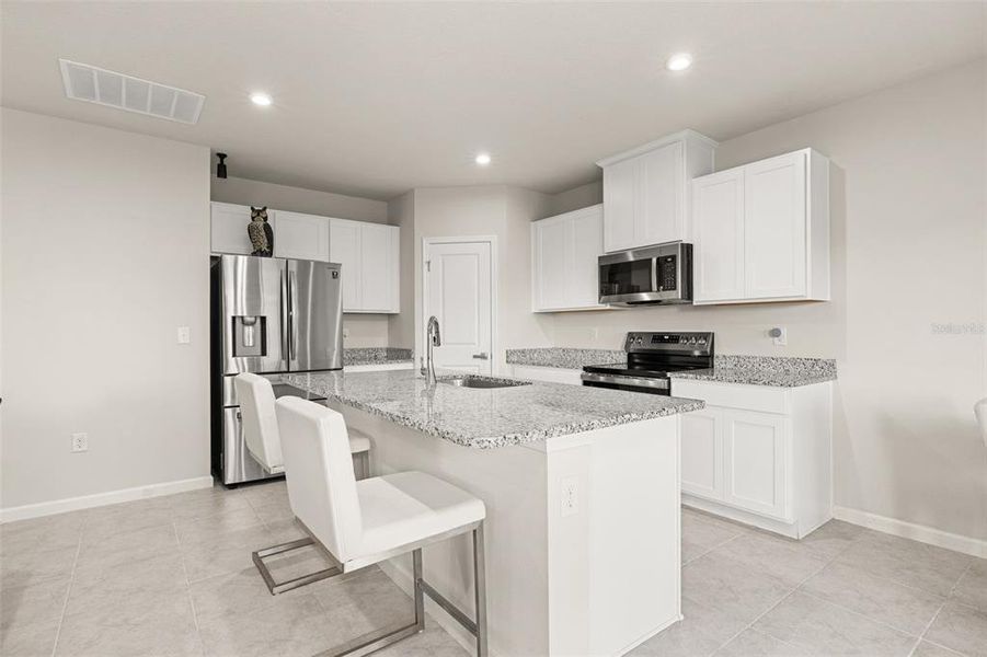 Furnished interior view inside a new home in , Sumterville (Image 15).
